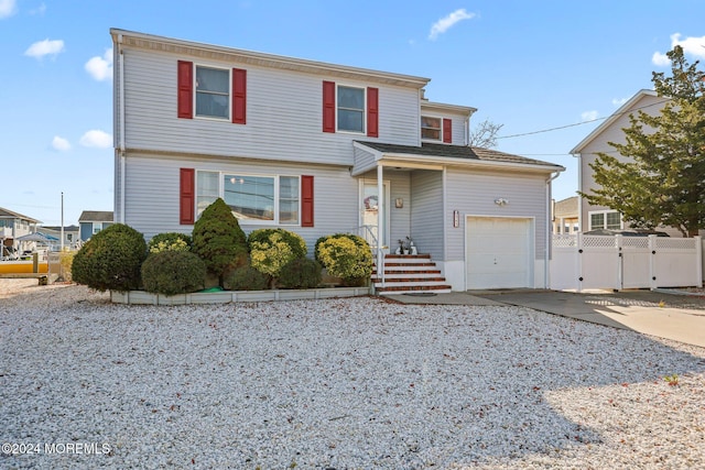 front of property featuring a garage