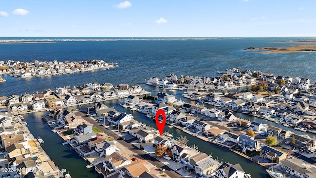 aerial view featuring a residential view and a water view