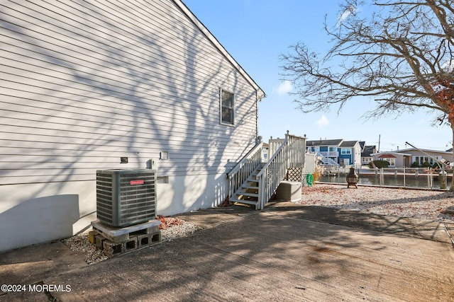 view of property exterior featuring central AC unit