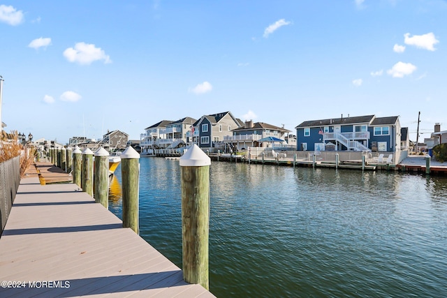 dock area featuring a water view