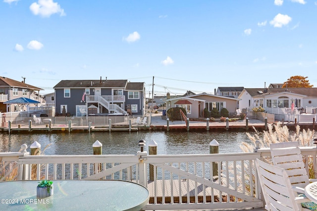 dock area featuring a water view