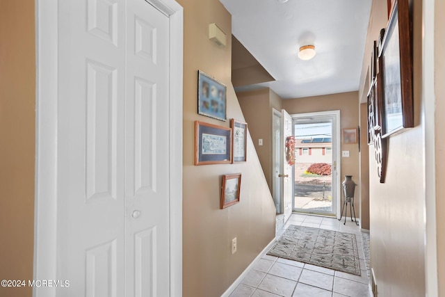 entryway featuring light tile patterned floors