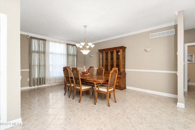 dining room with an inviting chandelier and ornamental molding