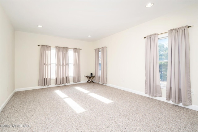 empty room with carpet flooring