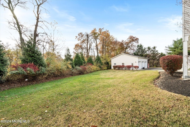 view of yard with a garage