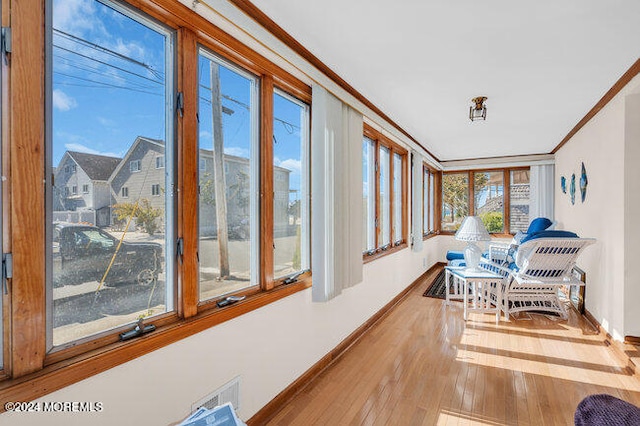 sunroom / solarium featuring a wealth of natural light