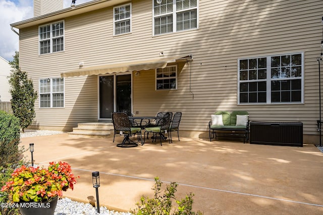 rear view of house with a patio area