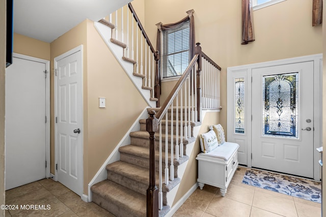 view of tiled foyer entrance