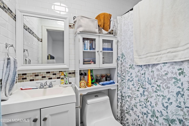 bathroom featuring vanity, a shower with shower curtain, and toilet