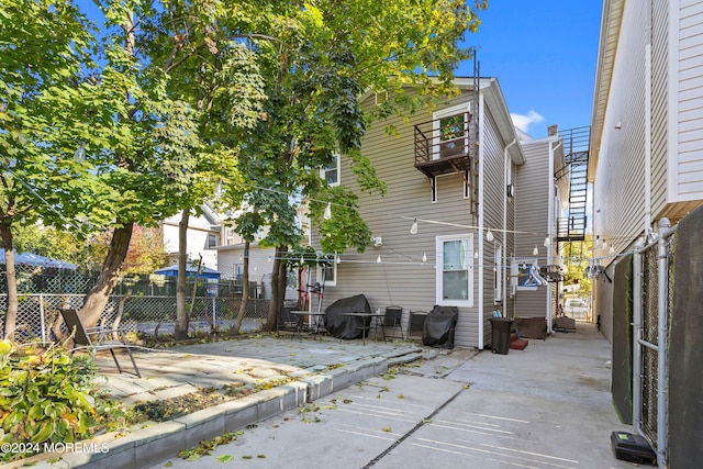 rear view of house with a patio