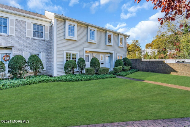 view of front of house with a front yard