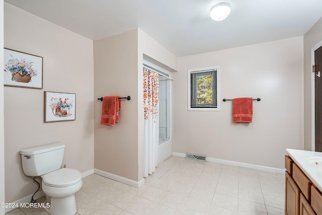 full bathroom with toilet, tile patterned flooring, vanity, and shower / tub combo