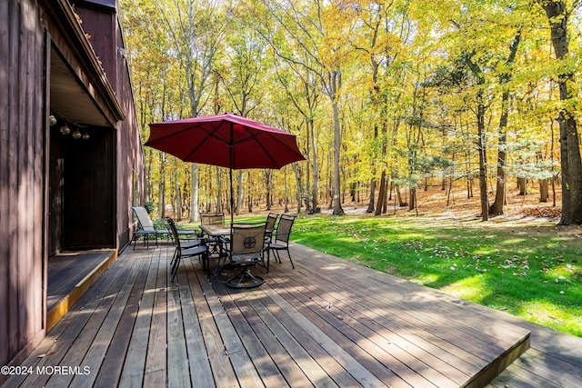 2 Filmore Dr, Millstone, NJ 08510 - wooden deck with a lawn, a view of trees, and outdoor dining space