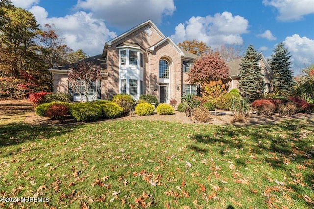 front of property featuring a front lawn