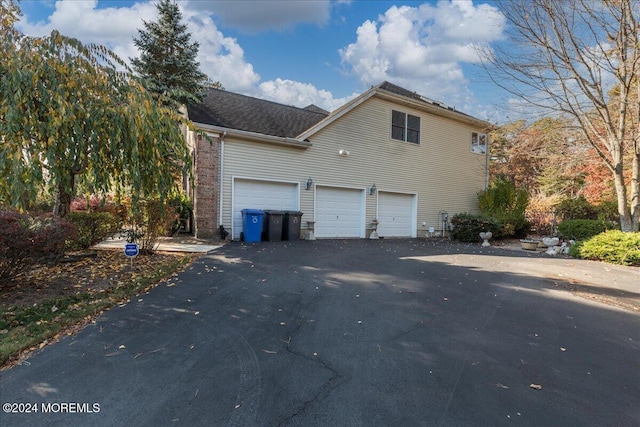 view of home's exterior featuring a garage