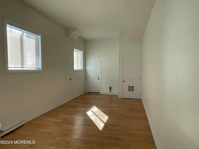 spare room featuring light hardwood / wood-style floors