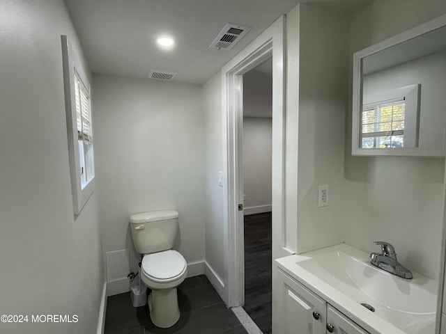 19 Nicholas Blvd, Jackson, NJ 08527 - half bathroom with vanity, tile patterned floors, toilet, and visible vents