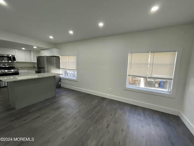 19 Nicholas Blvd, Jackson, NJ 08527 - kitchen featuring light stone counters, appliances with stainless steel finishes, baseboards, and white cabinetry