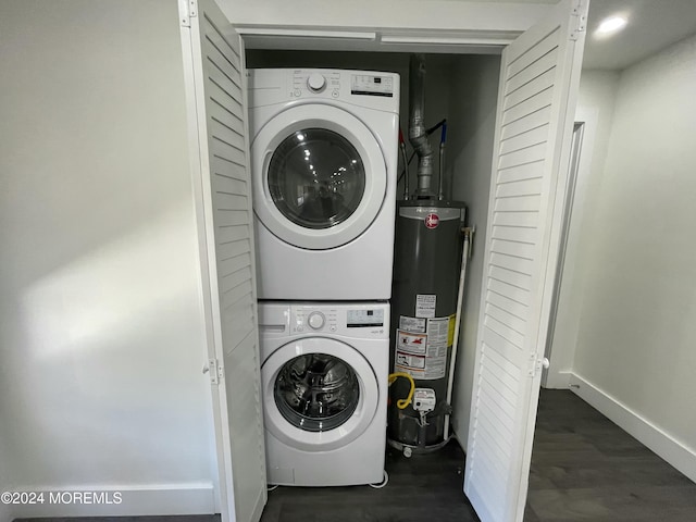 19 Nicholas Blvd, Jackson, NJ 08527 - clothes washing area with stacked washer / drying machine, laundry area, gas water heater, baseboards, and wood finished floors