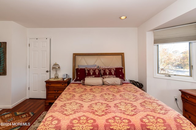 bedroom featuring dark hardwood / wood-style floors