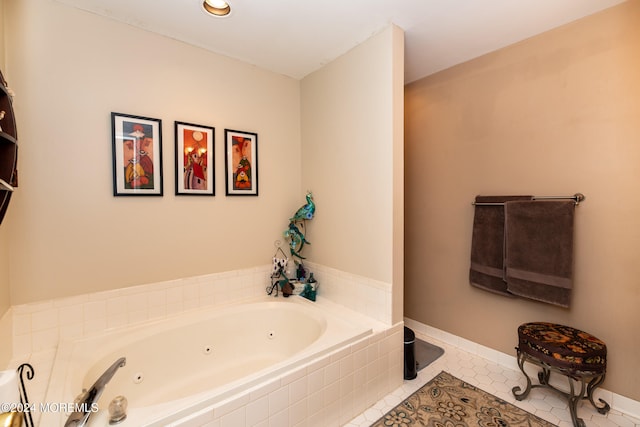 bathroom with tile patterned floors and tiled tub