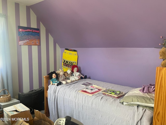 bedroom featuring vaulted ceiling