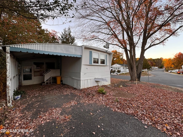 view of property exterior at dusk