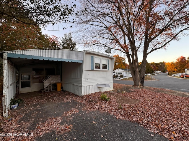 view of property exterior at dusk