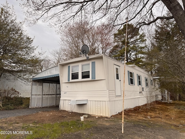 view of home's exterior with driveway