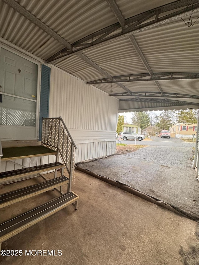 garage featuring a carport