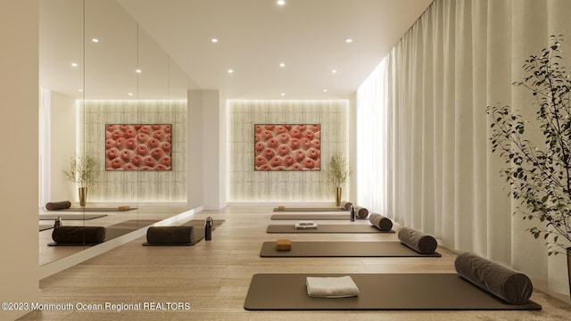 workout area featuring recessed lighting