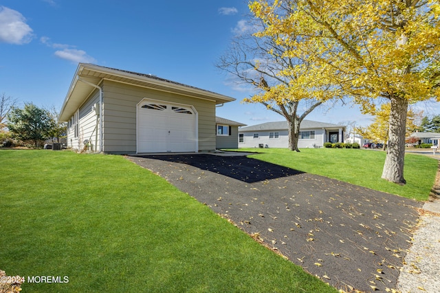 garage with a yard