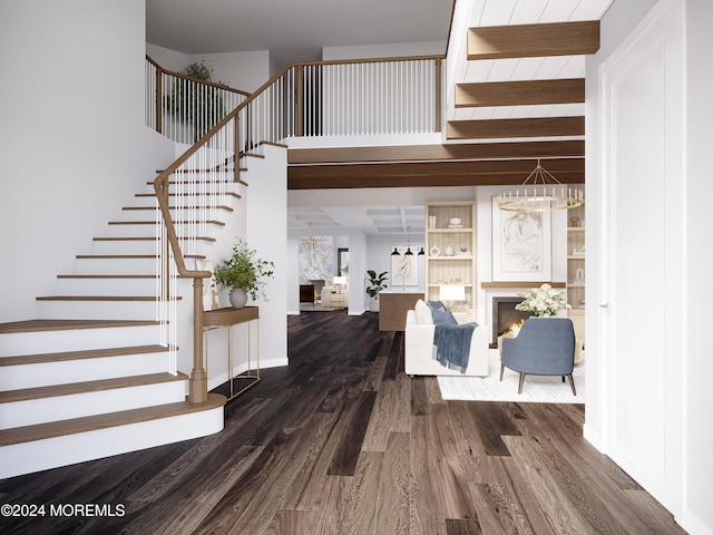 entrance foyer with beam ceiling, a notable chandelier, and dark hardwood / wood-style flooring