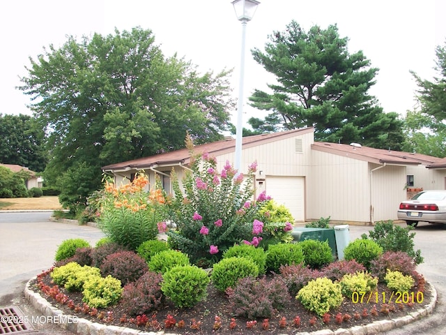 exterior space with a garage