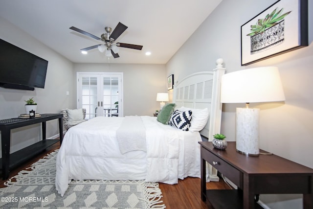 bedroom featuring dark hardwood / wood-style floors, ceiling fan, and french doors