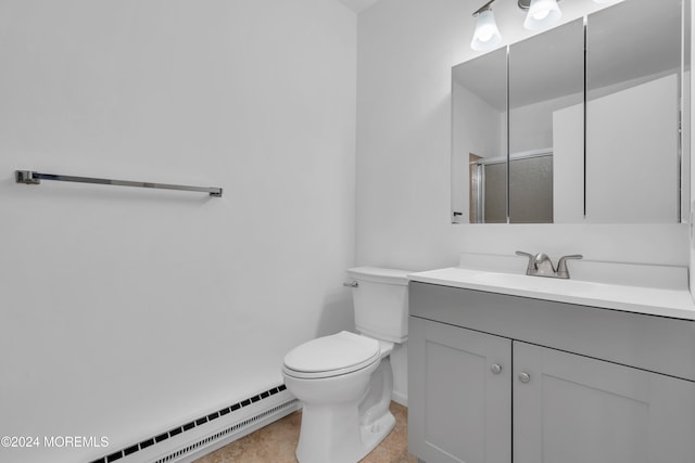 bathroom featuring baseboard heating, vanity, toilet, and an enclosed shower