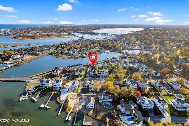 drone / aerial view featuring a water view