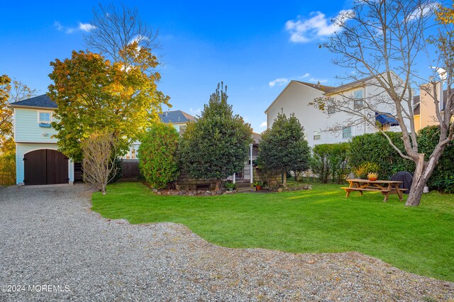 view of yard with a garage