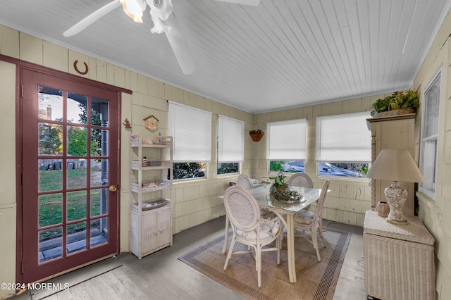 sunroom / solarium with ceiling fan and a wealth of natural light