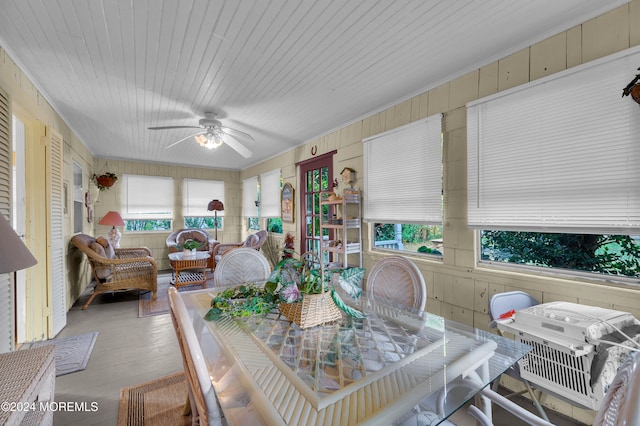 sunroom featuring plenty of natural light and ceiling fan