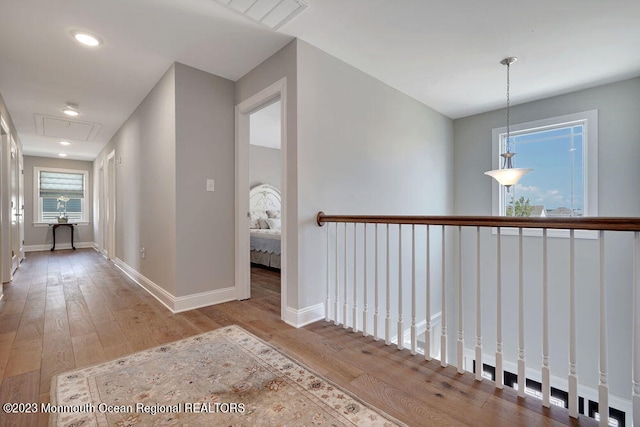 corridor featuring light hardwood / wood-style flooring