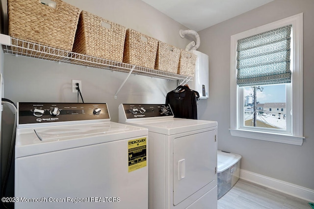 laundry area with washer and dryer