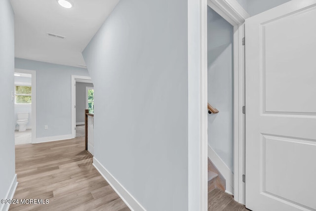 hallway featuring light hardwood / wood-style flooring