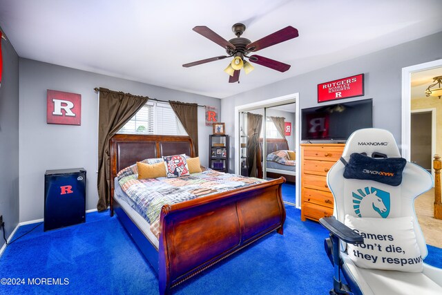 bedroom featuring a closet, ceiling fan, and dark colored carpet