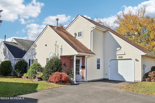 view of front of property with a garage