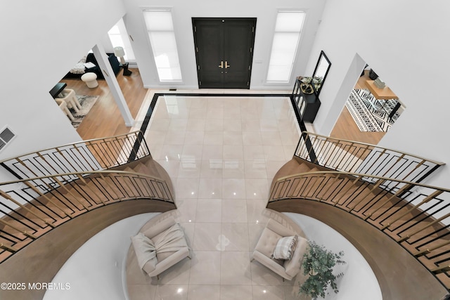 foyer entrance featuring tile patterned floors