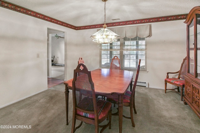 dining area with a textured ceiling, carpet flooring, an inviting chandelier, and baseboard heating