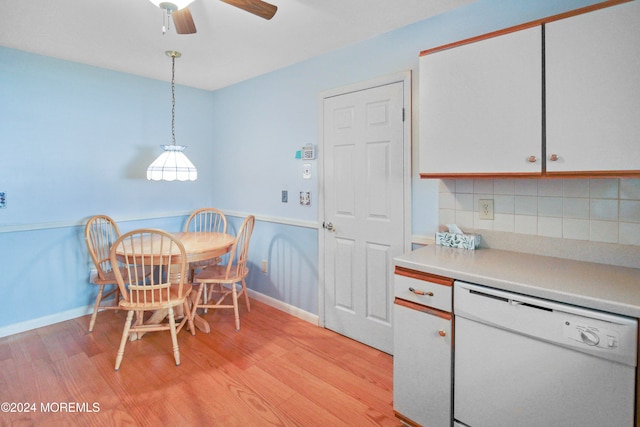 kitchen with backsplash, white cabinetry, dishwasher, pendant lighting, and light hardwood / wood-style floors