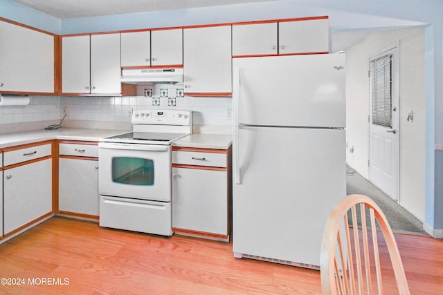 kitchen featuring white cabinetry, light hardwood / wood-style flooring, and white appliances