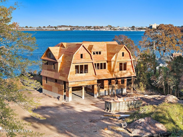 view of front of home featuring a water view